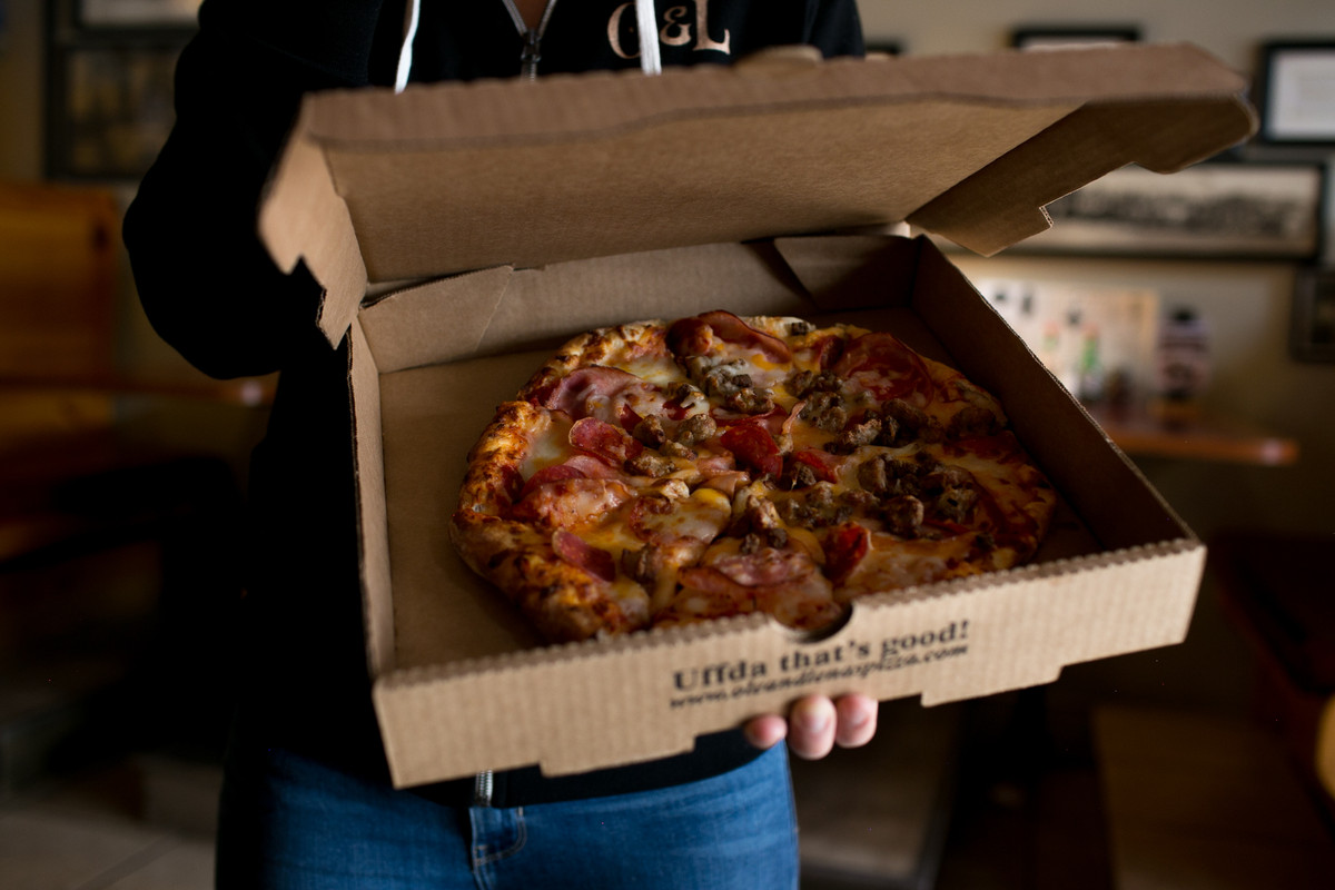 An Ole & Lena’s pizza in its box